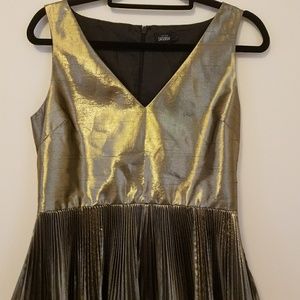 Gold pleated peplum top